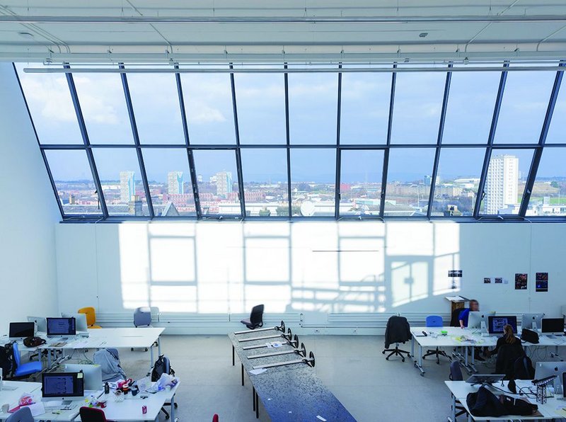 North light and south light, captured from the mezzanine of one of the sixth floor studio spaces. The height of the building on top of a drumlin means it teeters on the edge of the city centre with amazing views out north.