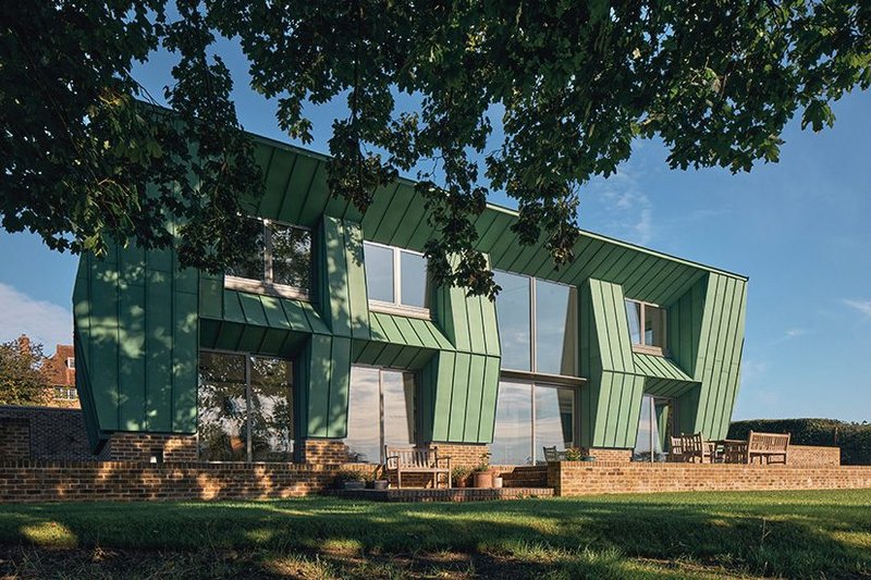 The ‘prows’ above the glazing maximise solar gain in winter and minimise it in summer