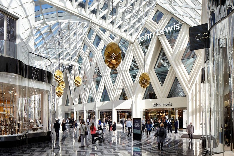 The diagrid roof and patterns of the arcade are given more expansive expression in the cladding on the John Lewis store.