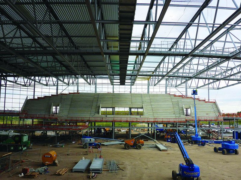 The main auditorium seating is positioned at the south of the arena.