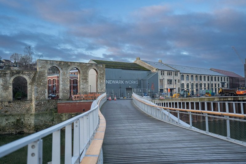 Infrastructure is forecast to grow modestly despite the downturn, and has an important role in unlocking further development. This bridge, designed by Marc Mimram, is part of a new commercial development in Bath which is being spearheaded by Newark Works.