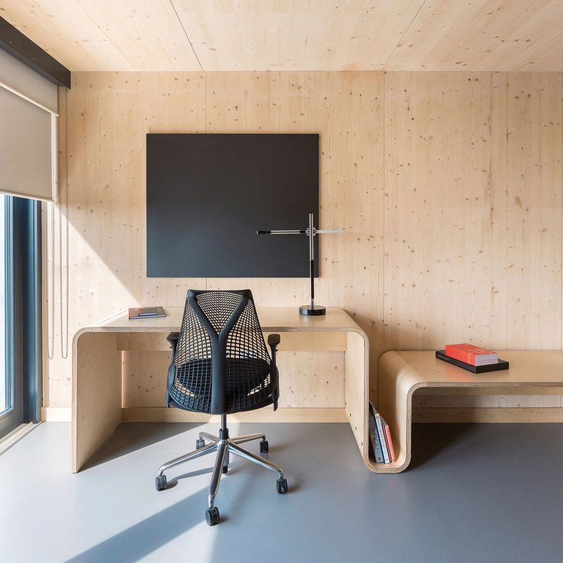 Bedroom, washing and kitchen pods give a familiar sense of a house in the massing – though every room has its own front door.