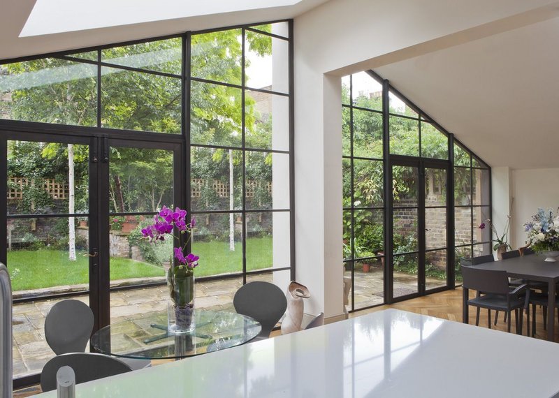 London townhouse featuring bronze screen and double doors by Architectural Bronze Casements.