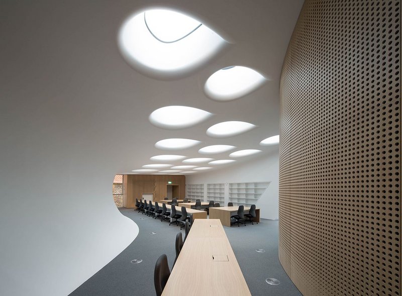 The library with its 'soft' ceiling and teardrop skylights.