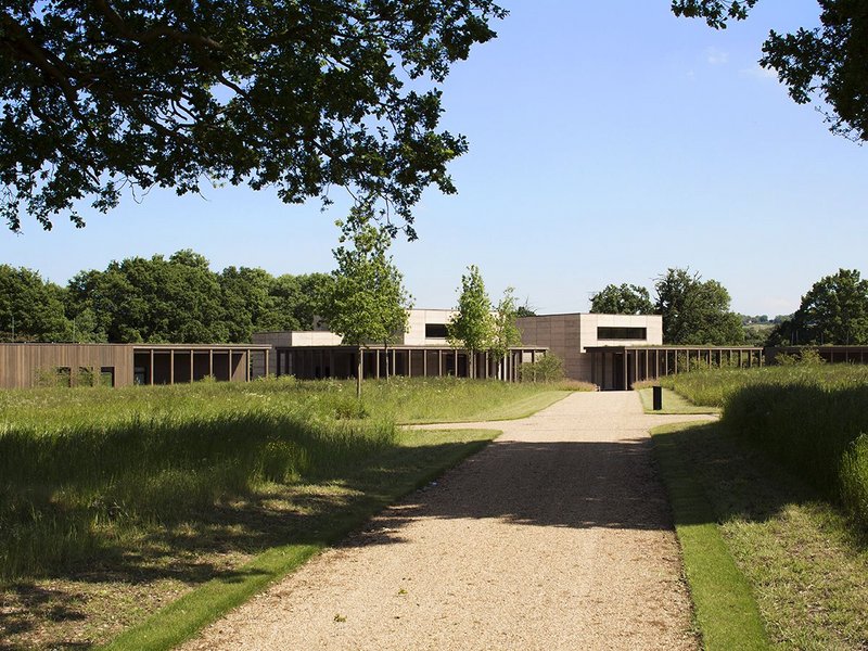 The new buildings sit within a landscaping scheme designed by  J & L Gibbons.