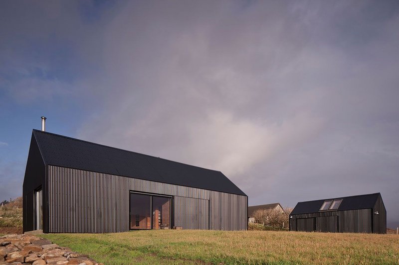 The two-part composition. The owners hope to create a further mezzanine in the workshop for a library.