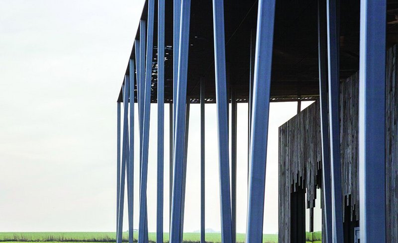 Super-slender columns emulate copses on Salisbury Plain at Stonehenge Visitor Centre