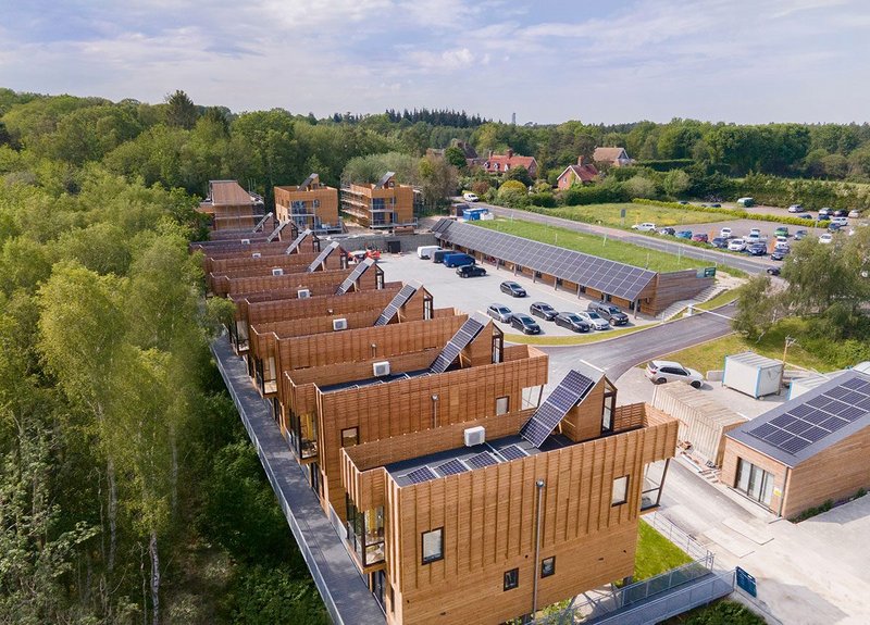 Detached workspace units and subterranean overnight accommodation block viewed from the south-east.