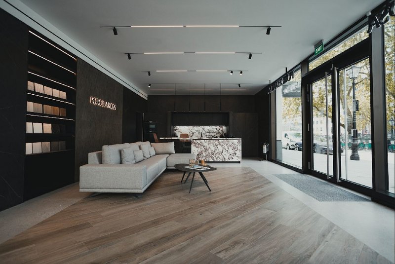 Porcelanosa at Hanover Square: The entrance to the showroom shows its natural wood collection and newest kitchen design with Viola Rossé worktop.