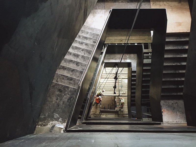 The vertiginous waxed steel staircase is a central focus of connectivity in a building formerly characterised by low, isolated floorplates.