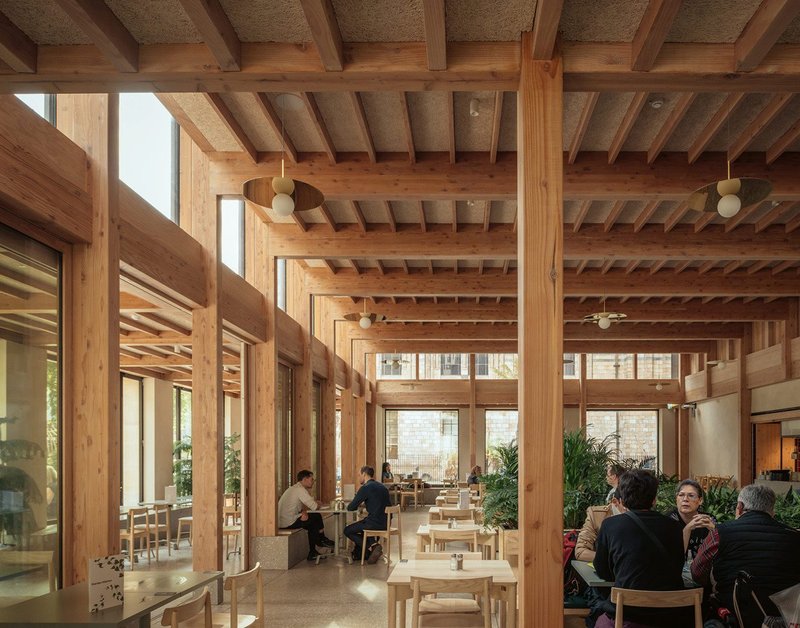 The Garden Kitchen has long spans of glulam and a lantern over the main space.