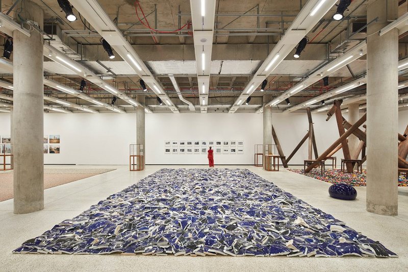 Installation view of Ai Weiwei: Making Sense at the Design Museum showing Left Right Studio Material, 2018, a field of porcelain fragments from Ai’s demolished studio.