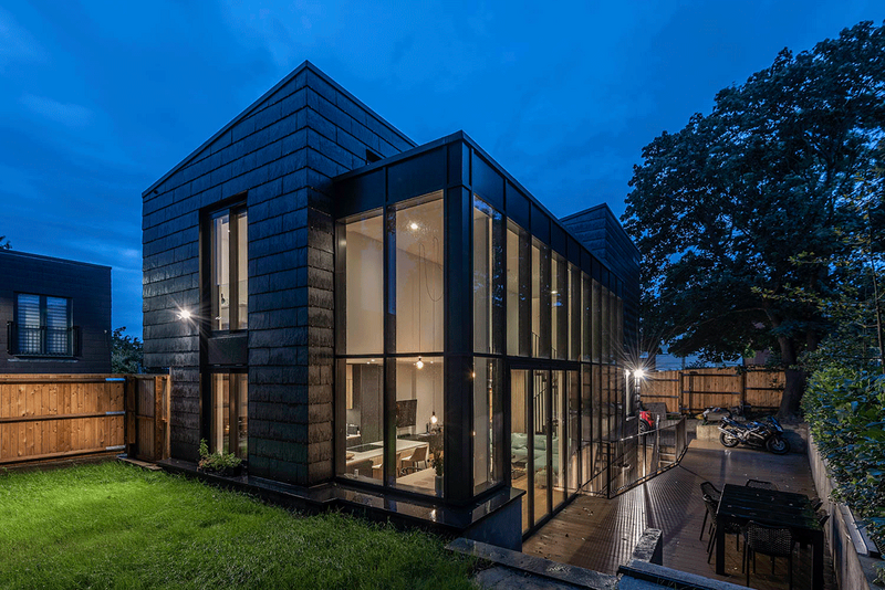 Cupaclad 201 Vanguard natural slate cladding at a property in Dollis Hill, London. The 60×30cm slates are installed horizontally using visible stainless steel clips.