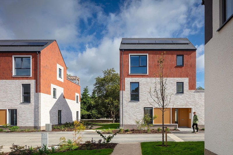 Wilkinsons Brook, Dublin, by Proctor & Matthews Architects. ICF walls are faced externally in render and brick slips. High levels of insulation help homes achieve an A1 building energy rating.