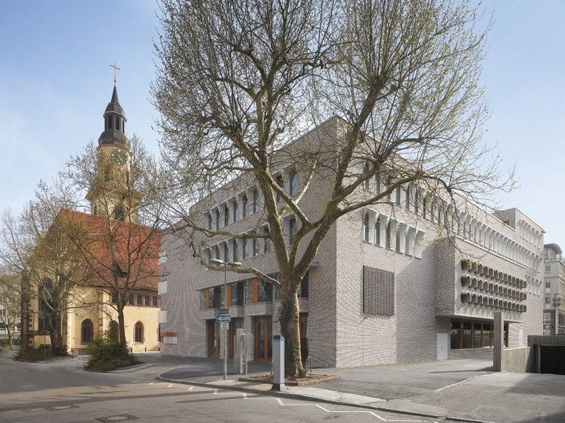 The Hospitalhof looking south, the entrance to the complex between the old  church and new block.