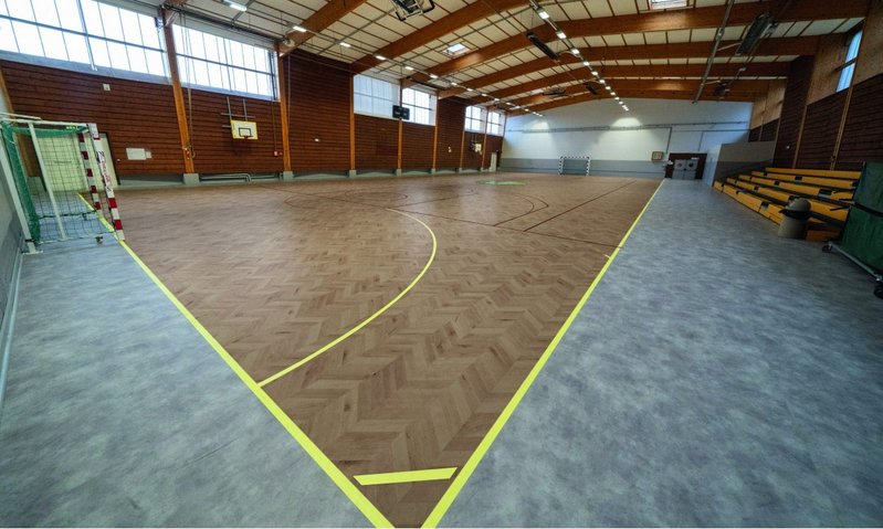 Gerflor Taraflex sports flooring offers the highest levels of performance, comfort and safety. Shown here are new designs Natural Herringbone and Pure Concrete.