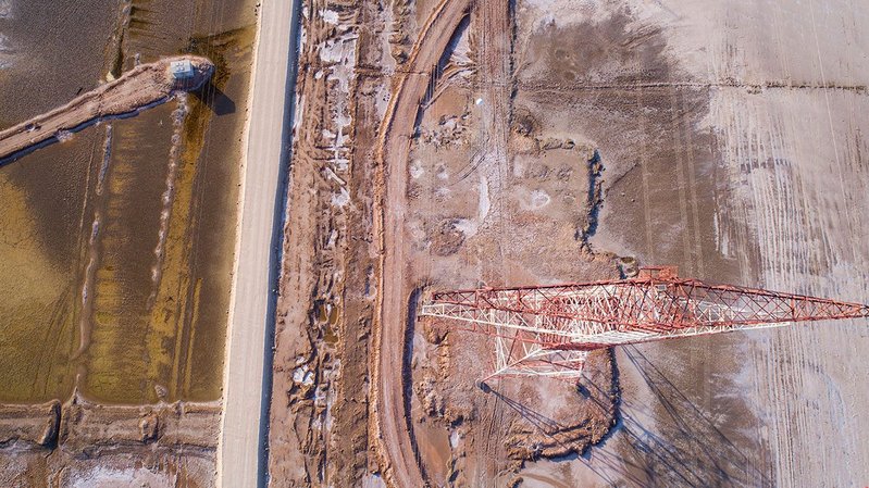 Aerial image of Al Ruwais Sabkha in the UAE, the flat salt-encrusted desert that inspired the pavilion.