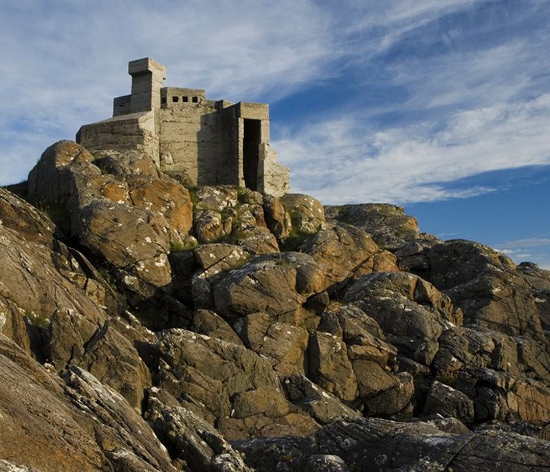 Hermit’s Castle at Achmelvich in Scotland.