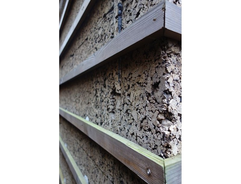 External cork insulation of a Victorian end-terraced house in south London by Venner Lucas Architects.