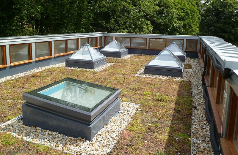 Thirty-degree opening Surespan Aero Pyramid Skylights with a fully opening Surespan Aero Access rooflight.