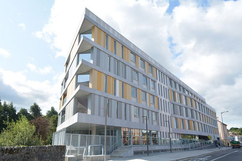 Swisspearl Carat, Nobilis and Reflex fibre cement cladding in complementary shades of yellow and grey at the Graduates student accommodation in Cork.