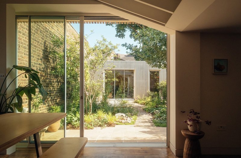 More than your everyday in/out interface: Maxlight sliding doors to the courtyard garden at Hope Villa, Southwark.