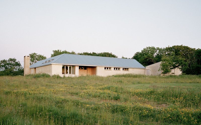 Cows can graze right up to the house’s outer walls.