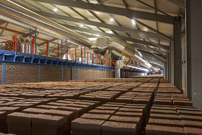 Vandersanden's new 240-metre tunnel kiln in Tolkamer. It is 60 metres longer than a conventional tunnel kiln and replaces three older tunnel kilns of 140 metres, while maintaining the same production capacity.