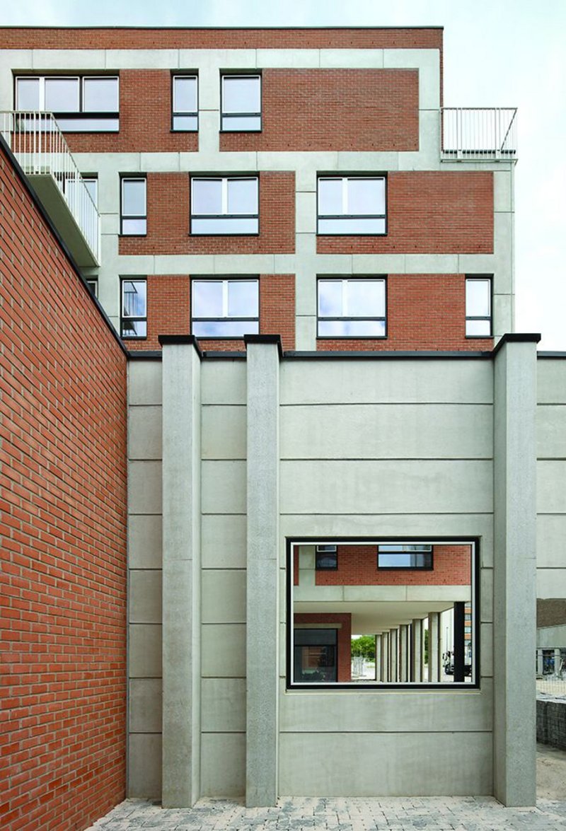 View east from the community hall ‘smoking courtyard’ to the larger of the two new housing blocks.