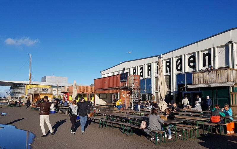 The street food market is a creative reuse of a former newsprint storage warehouse.