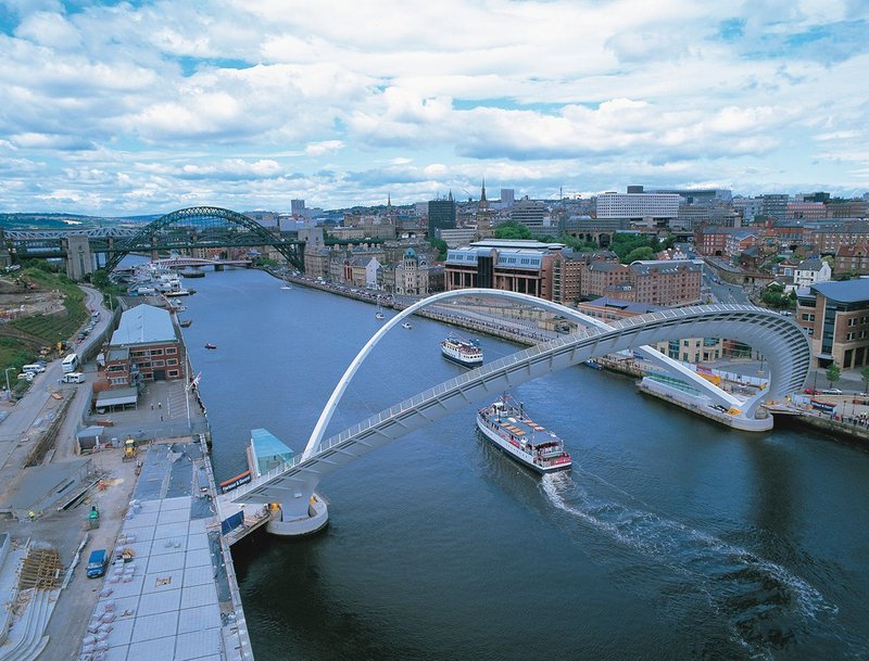 The bridge deck rotates up to allow large river traffic to pass beneath.