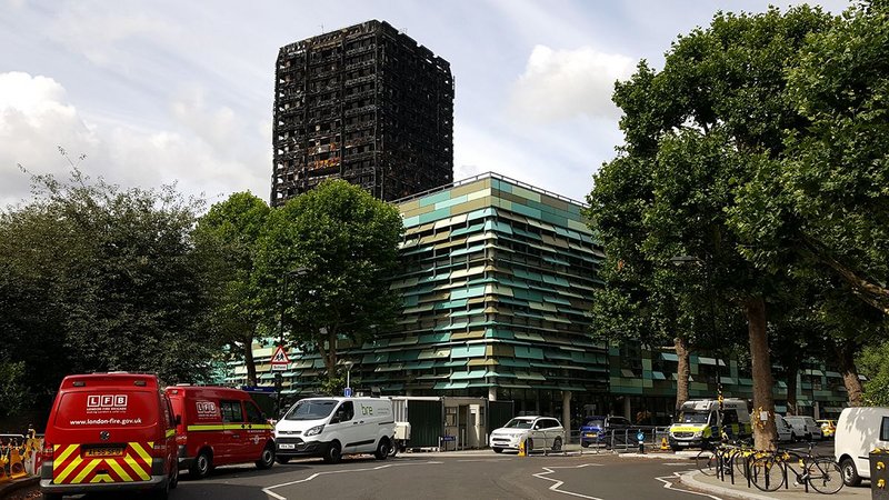 Grenfell Tower is now an investigation site, shown here a month after the catastrophic fire.
