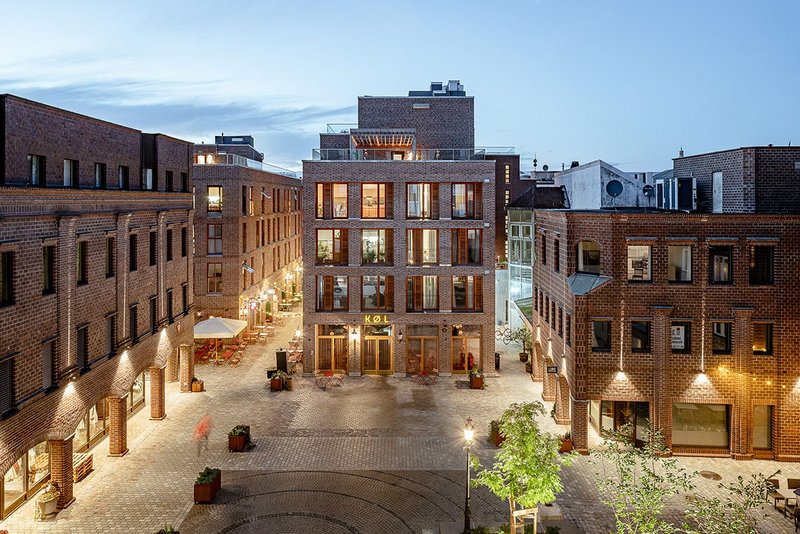 The passage to the left of the square is new, with a new arcade of retail and commercial units at ground floor.