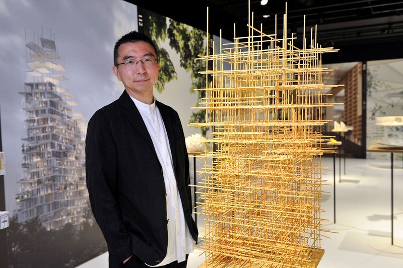 Sou Fujimoto, acclaimed Japanese architect, inspects one of 100 exhibits on display in his exhibition Futures of the Future at Japan House London