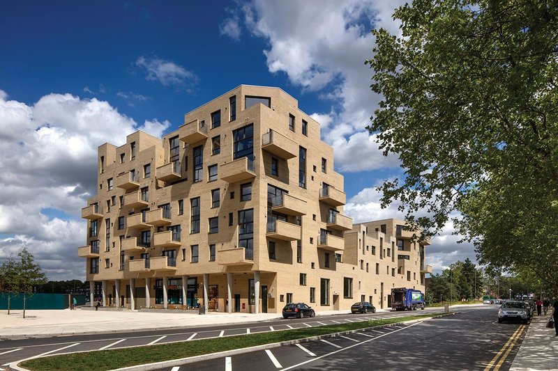Peter Barber’s newly completed housing for private sale is part of the first phase of the Grahame Park redevelopment and forms the eastern side of the new southern gateway square.