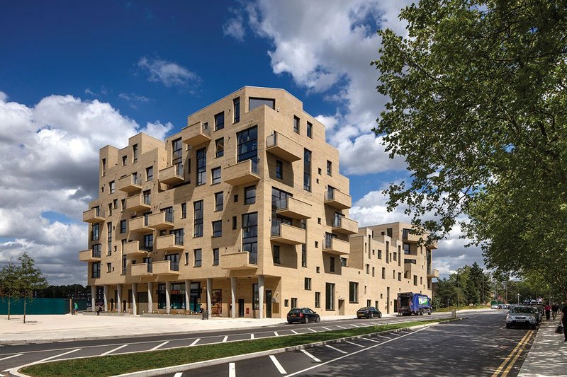 Peter Barber’s newly completed housing for private sale is part of the first phase of the Grahame Park redevelopment and forms the eastern side of the new southern gateway square.