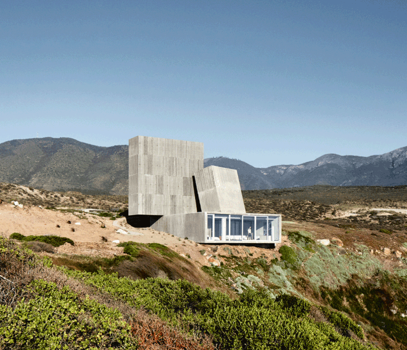 Ocho Quebradas House, Elemental, Los Vilos, Chile, 2016. The main living space opens onto the landscape while the upper volume, with shutters closed, has a highly sculptural appearance.