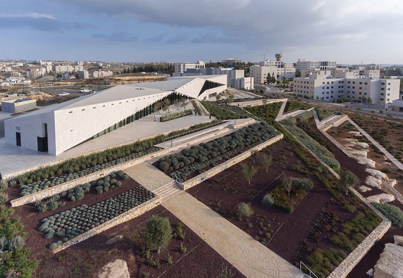 Looking towards the west elevation of the Palestinian Museum, the building manifests itself as an element in a much wider landscape.