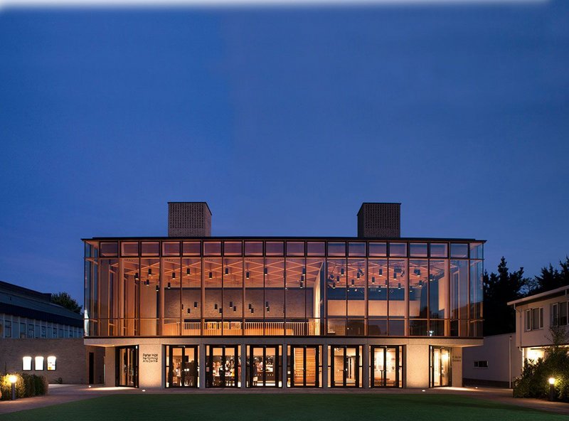 The main elevation of The Perse School showing the timber lattice roof structure.