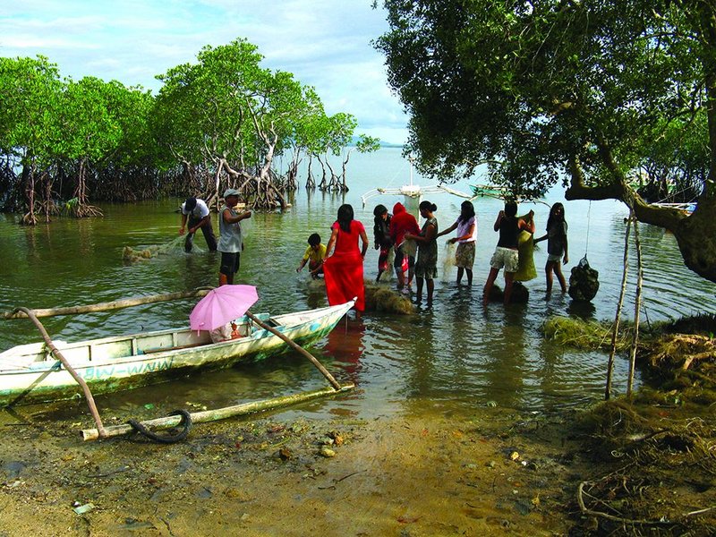 Locals collecting the discarded nets and post consumer waste marring their shoreline, and generating revenue as they do so.