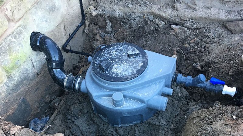 The Sanifos pump is sited underground and takes black and grey waste from multiple appliances in the extension, pumping it along the pipework to a large drain. A pump was used because there was insufficient gravity fall.