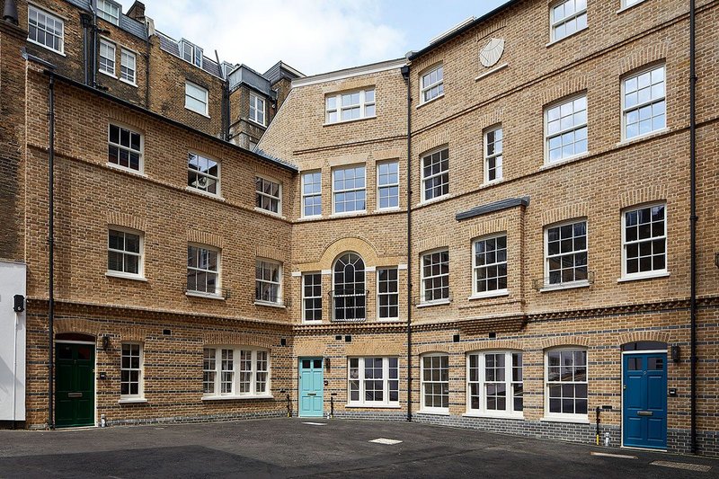 Lomax + Wood timber sash windows, entrance doors and fire windows at new-build Deans Mews, Marylebone, London.