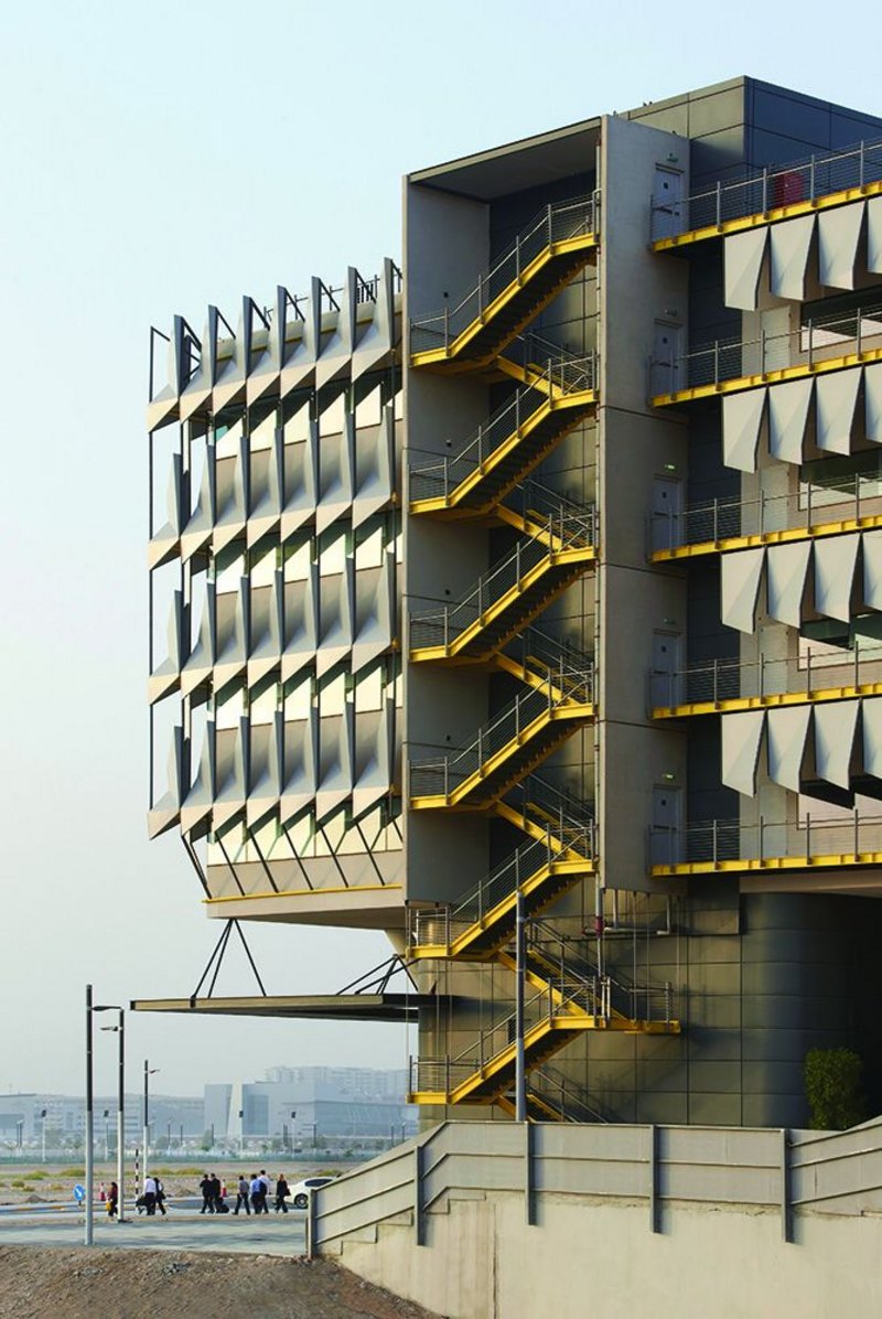 The north-west elevation takes good advantage of its steel sunshading facade to cut out low west light and demonstrates the strategy of the escape stairs, made external to reduce added cooling load on the building.