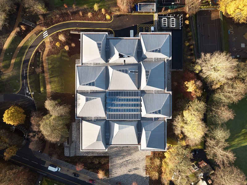 The roofscape is the key to the whole building arrangement, its modules turned this way and that to suit the uses inside.