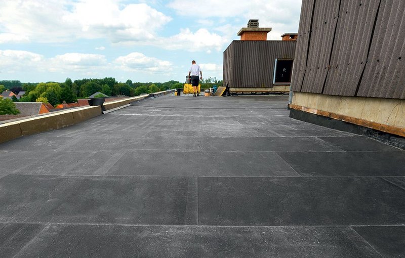 Tapered insulation schemes keep flat roofs dry and the buildings beneath them warm.