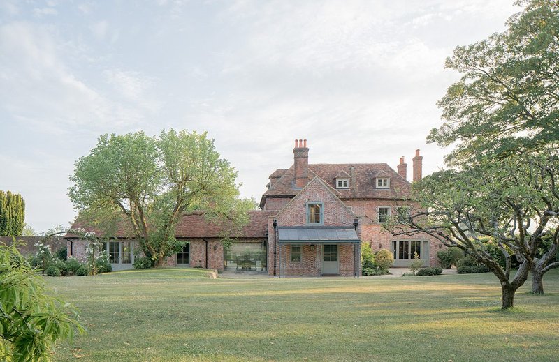 A new extension to the main house replaces unsympathetic additions.