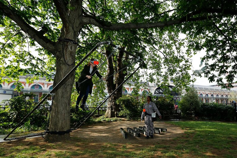 City workers will experience the sensation of flying when they ride the swings wearing virtual reality goggles.