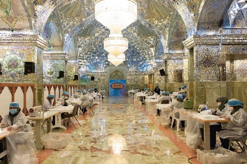 Mask makers at the Shah Cheragh mosque, Iran, April 2020