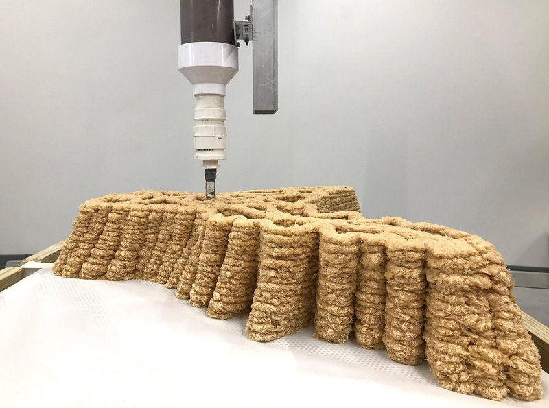 An industrial robot with customised extruder allows for 3D-printing using 100% wood and wood-based products