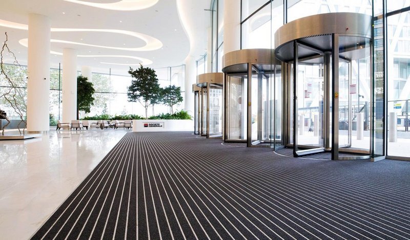 Intrasystems' Intralux fibre entrance matting with Intraform double module aluminium profile: For architects creating statement entrances that stay pristine - whatever the weather.